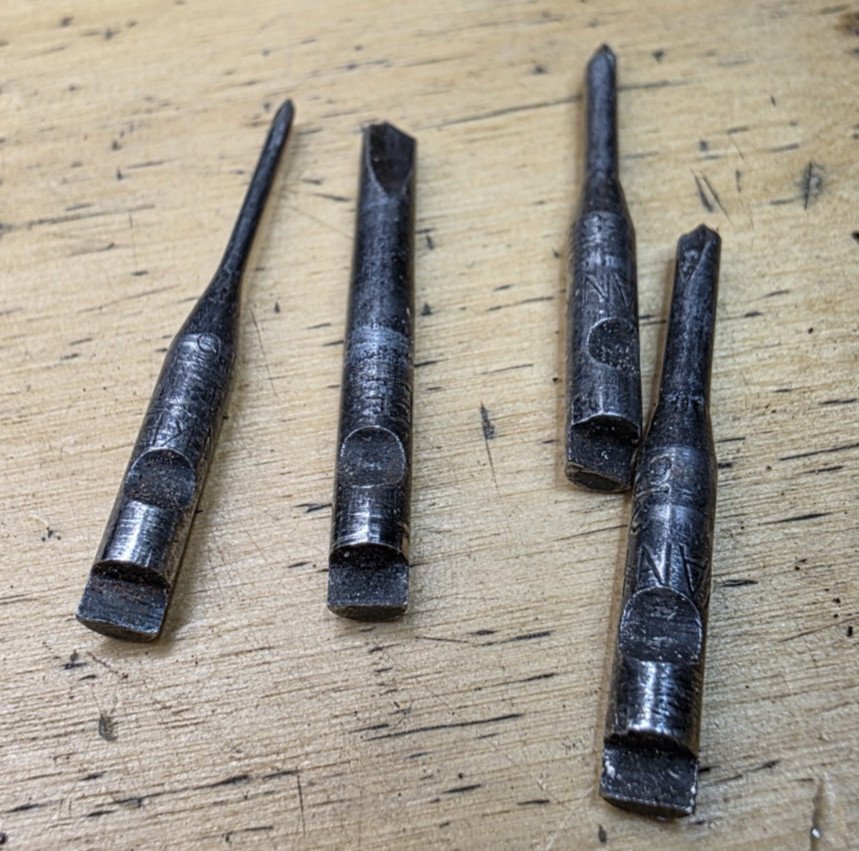 4 Yankee Drill Points in a Cork Case