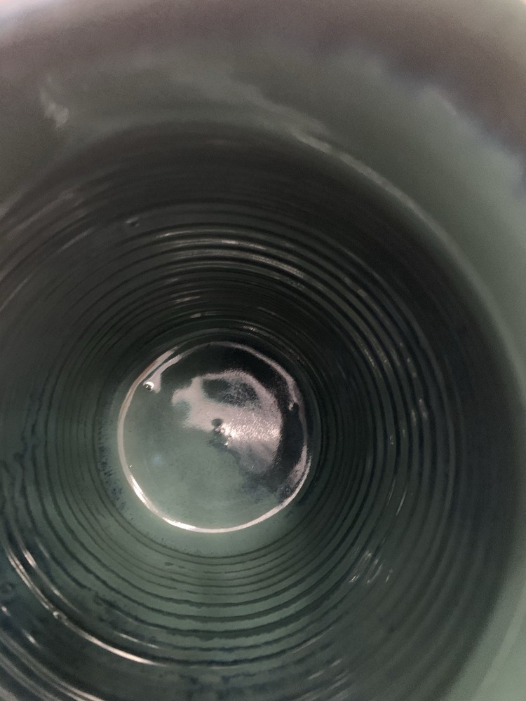 Signed Handcrafted Pottery Pitcher W/ Teal Green Glaze & Raised Leaf Pattern