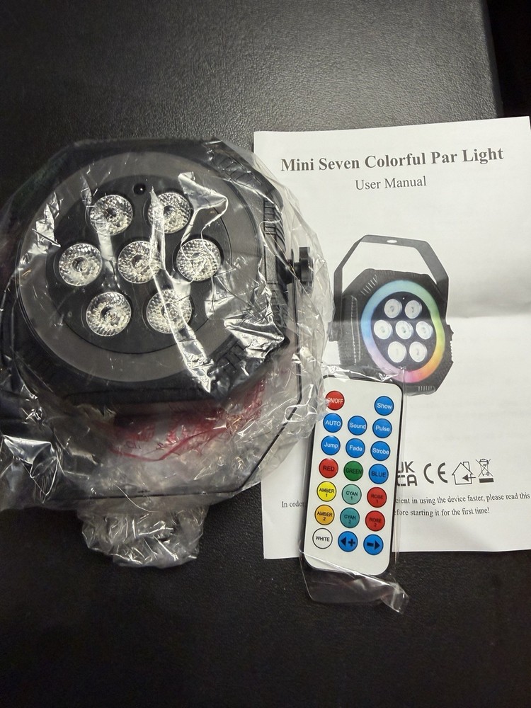 Mini Seven Colorful Par Light. Includes remote control for easy operation.