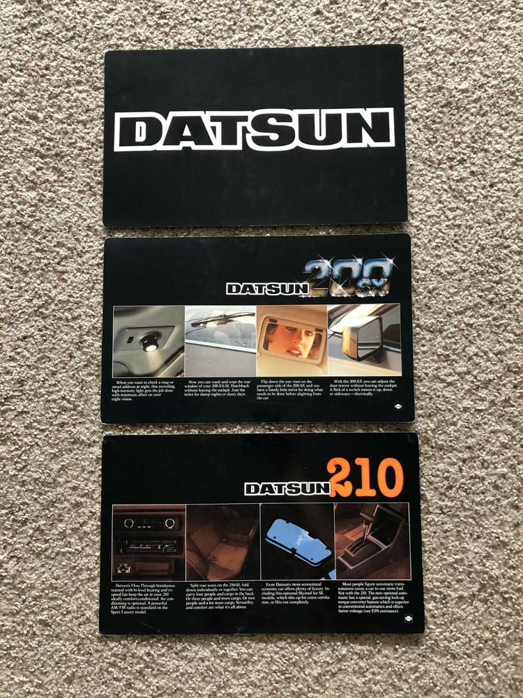 1970s Datsun three different showroom display cards.