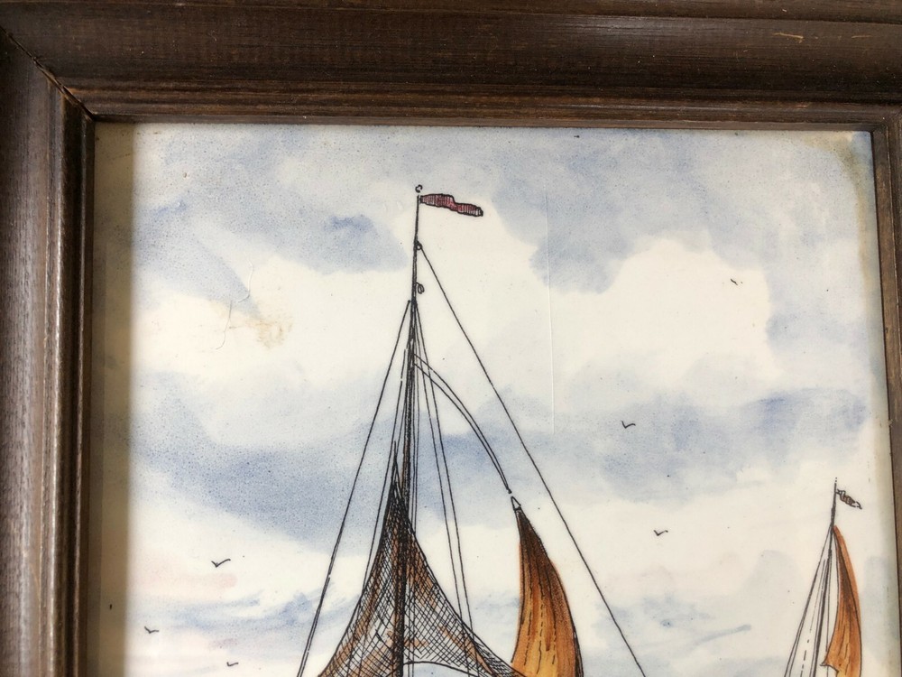 DELFT FRAMED POLYCHROME TILE . Signed and marked