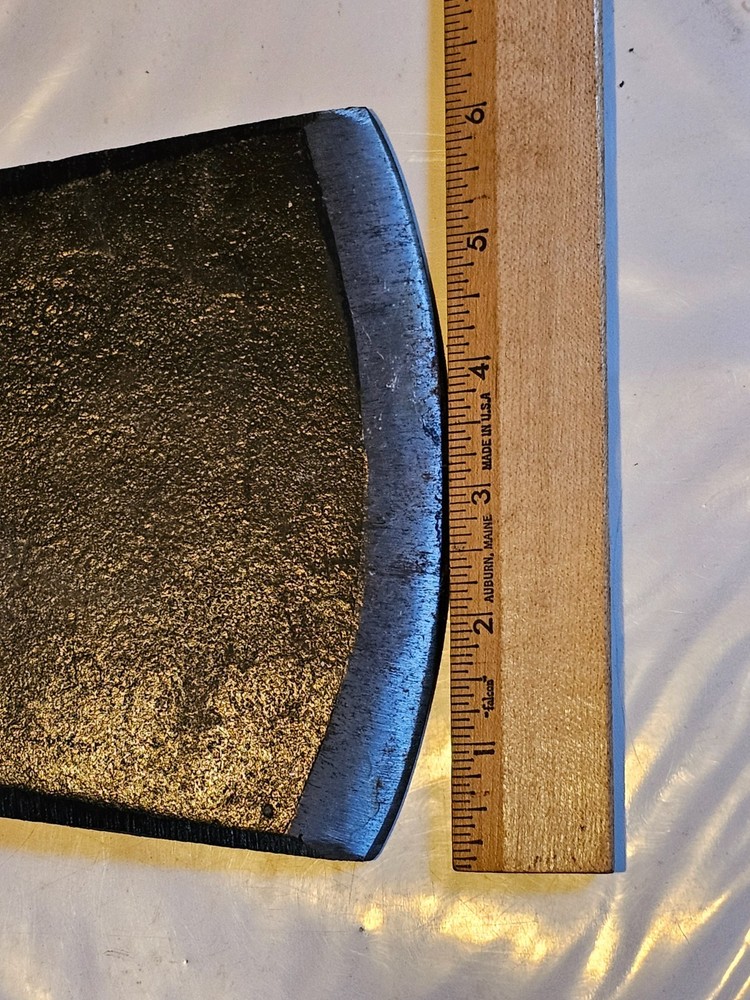 Axe Head has marked in Britain sticker on it