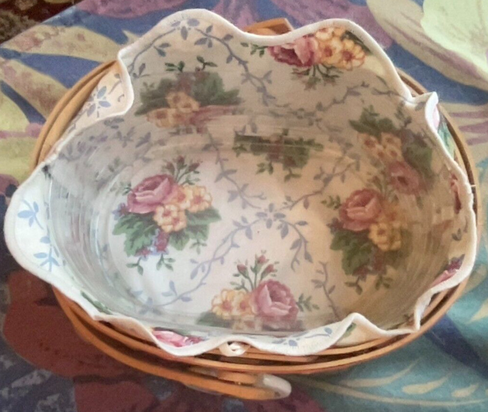 Longaberger Basket. Cloth & Plastic Insert. 1999. 4" Tall x 7" Long.