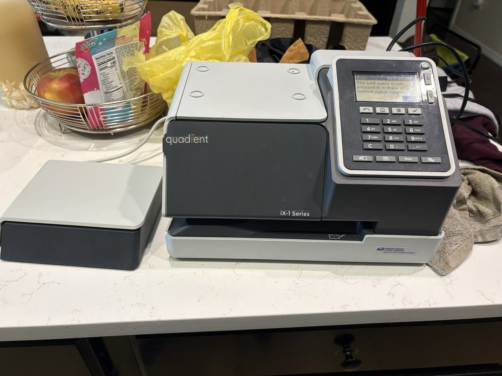 Quadient IX-1 Series Postage Printer.