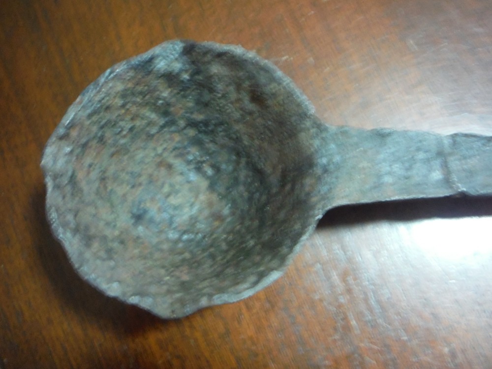 vintage huge metal spoon