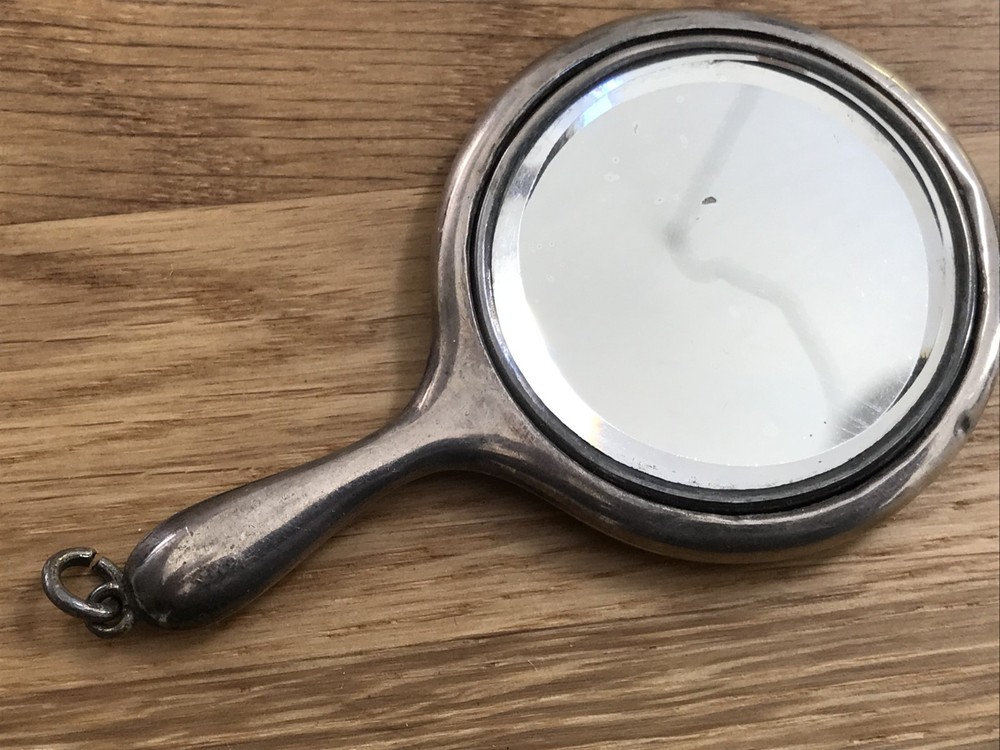 nice looking small size solid silver vanity mirror