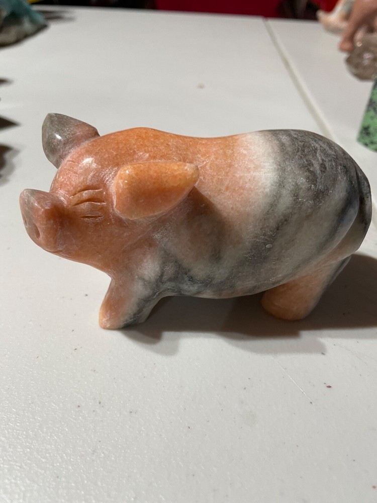 Sunstone pig carving