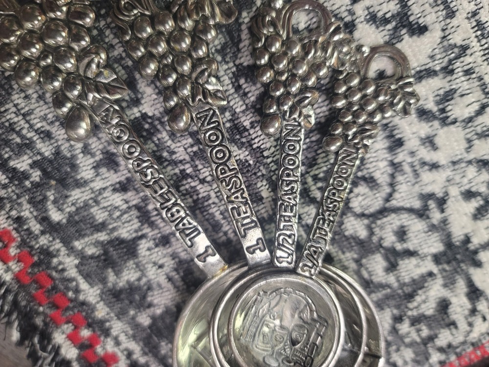 antique measuring cups and spoons