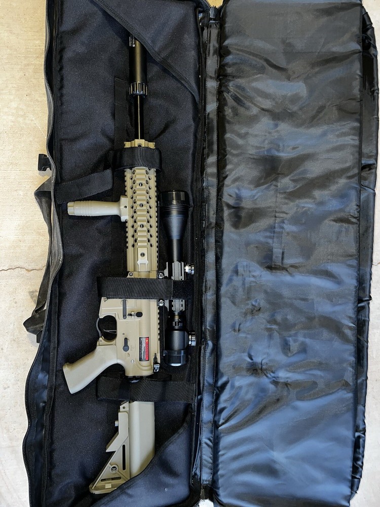 Airsoft Guns, Face Masks, And Mags