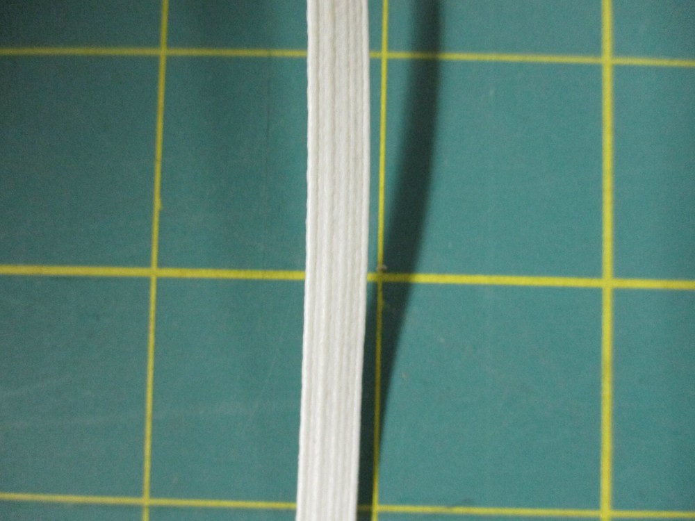 White 1/4" Elastic x 9+ Yards