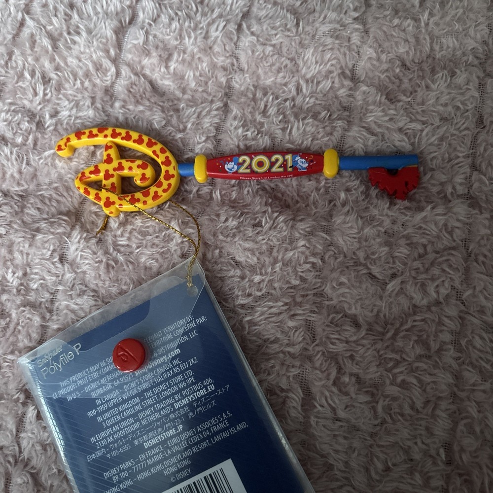 Disney store opening ceremony key 2021.