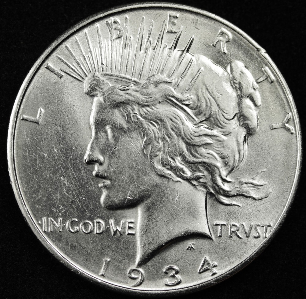 1934-d Peace Silver Dollar.  Nice A.U.   (Inventory A)