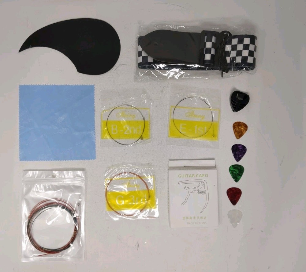 18pc Guitar Kit Capo + Strings + Picks + Pick Box + Guitar Checker Strap