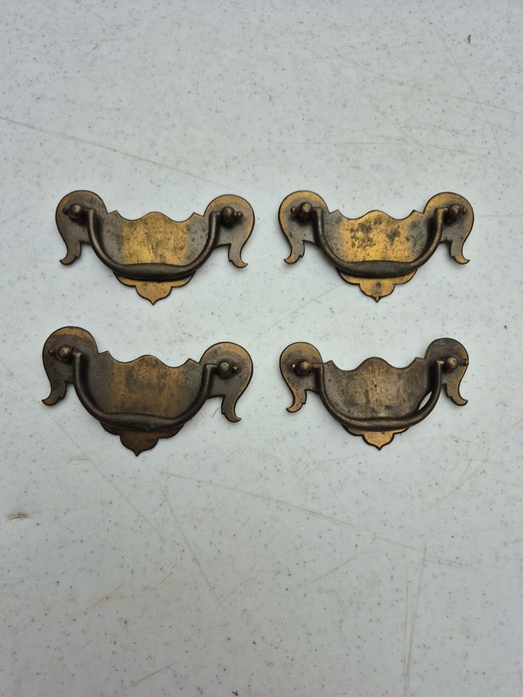Four  Vintage Drawer Pulls Batwing Style