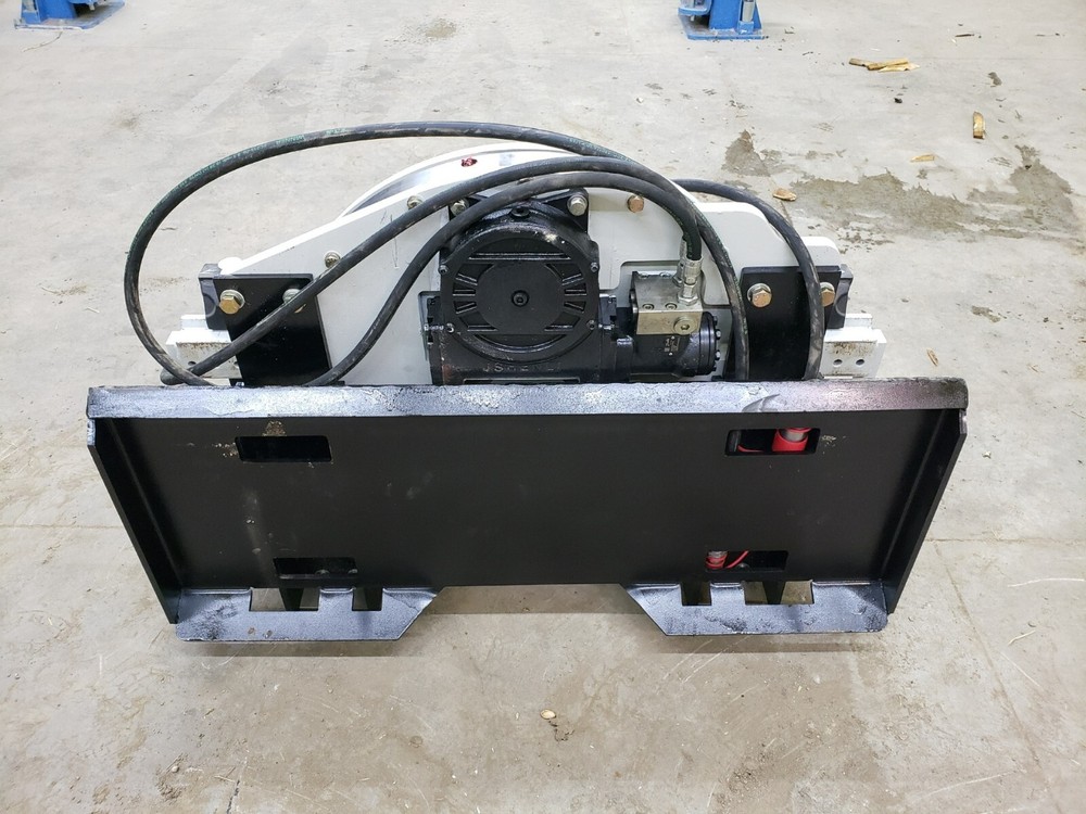 Skidsteer Bobcat fork rotator--- NEW WITH WARRANTY!!!