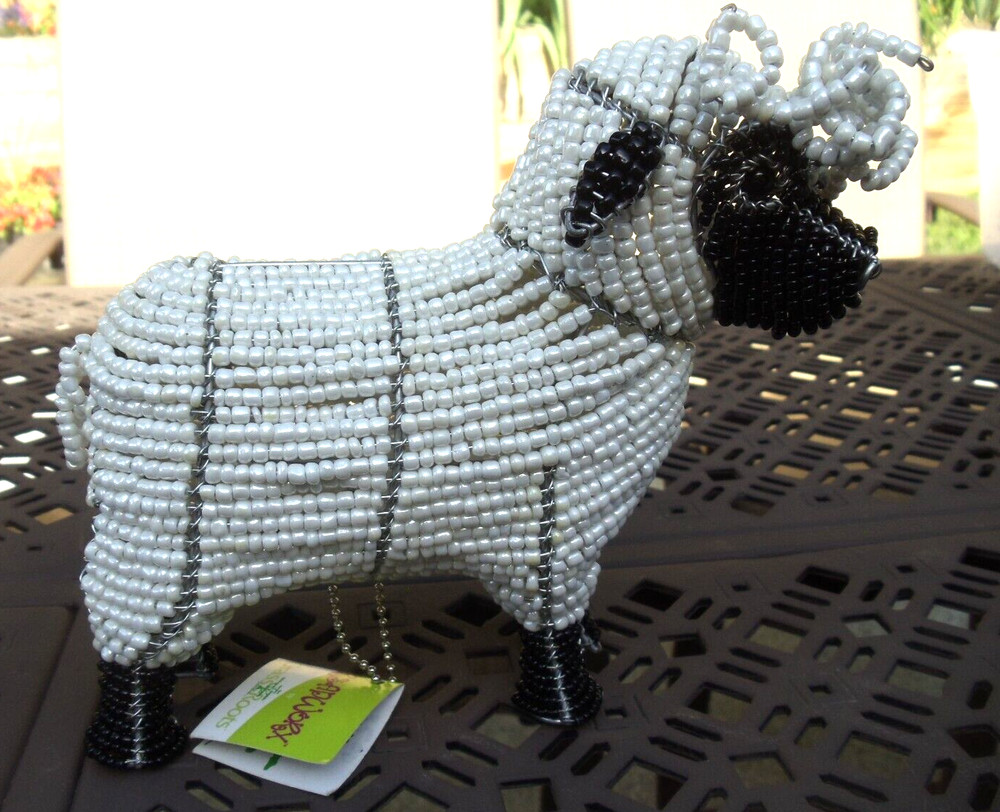 Beaded land:  White sheep