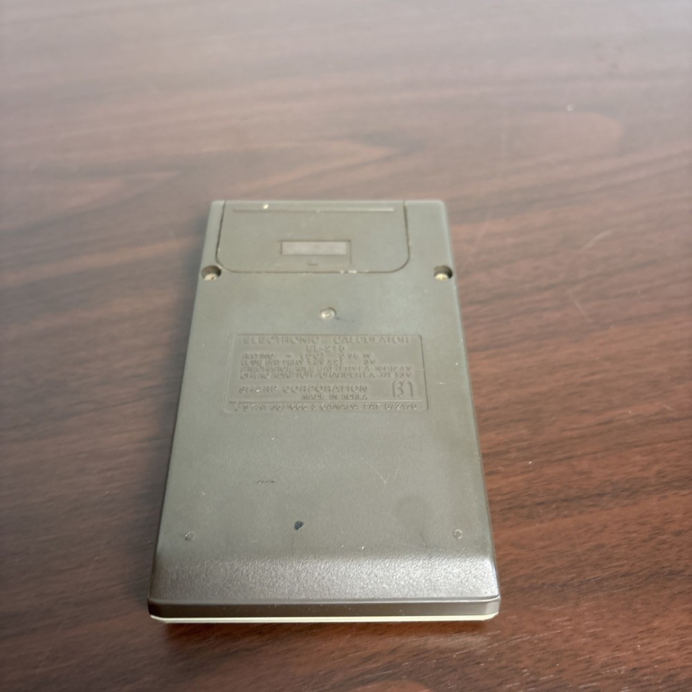 Sharp ELSI Mate EL – 215 Handheld Calculator With Cover Working