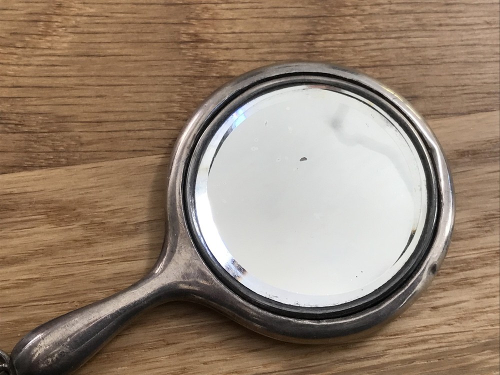 nice looking small size solid silver vanity mirror