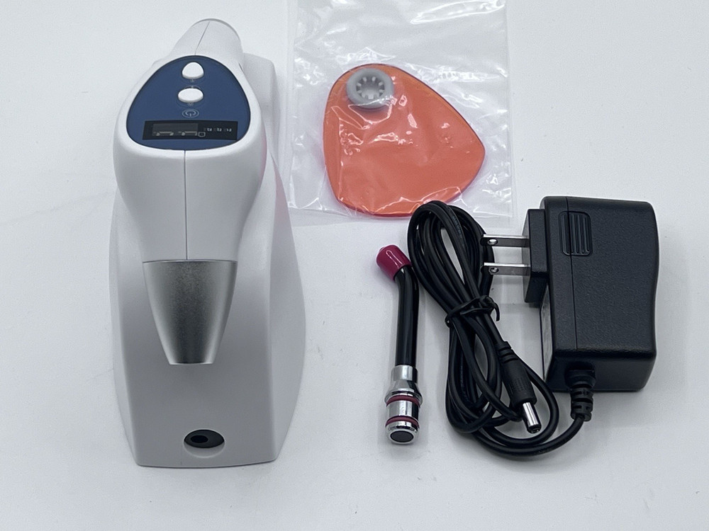 Dental 5W induction wireless curing light has dental caries detection function