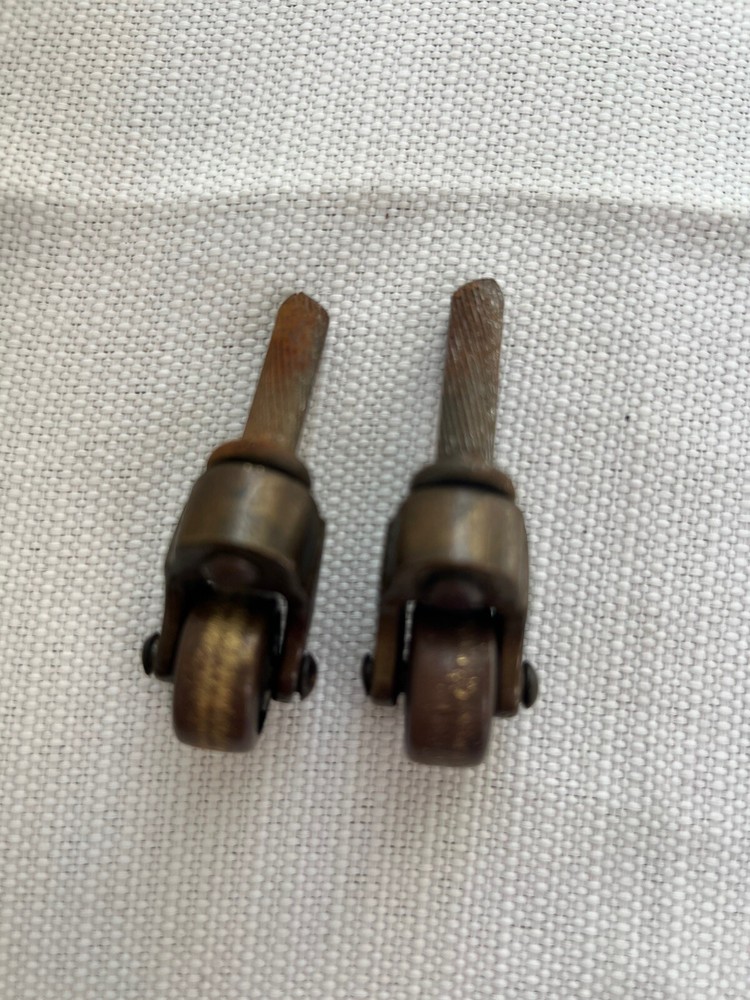 Two Antique Metal Casters