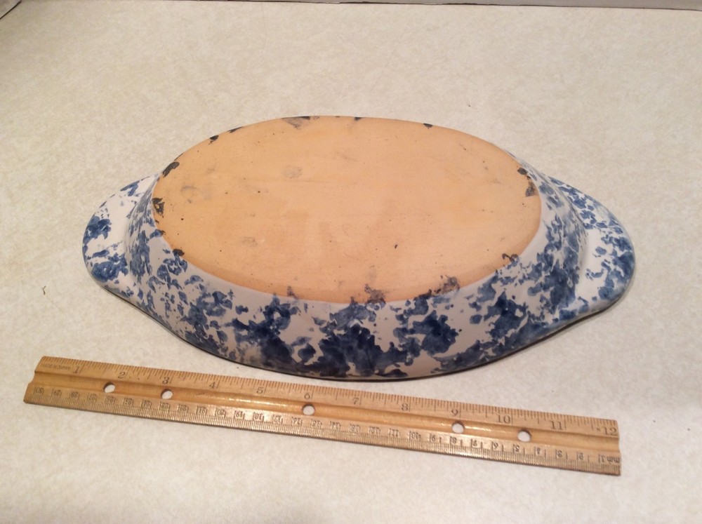 Oval blue spackled pottery dish, handcrafted
