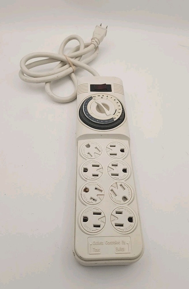 8 OUTLET PROTECTOR: SURGE TIMER + Reset Pre-owned  Extension Cord