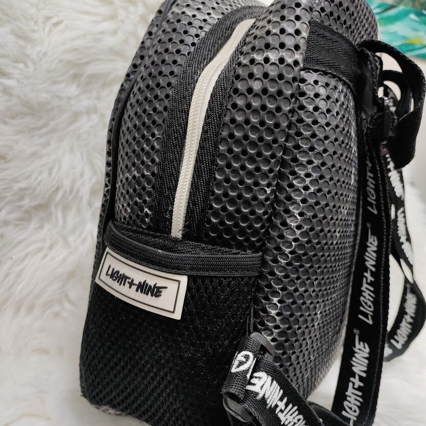 Light + Nine Little Mini Perforated Black and White Kids Backpack