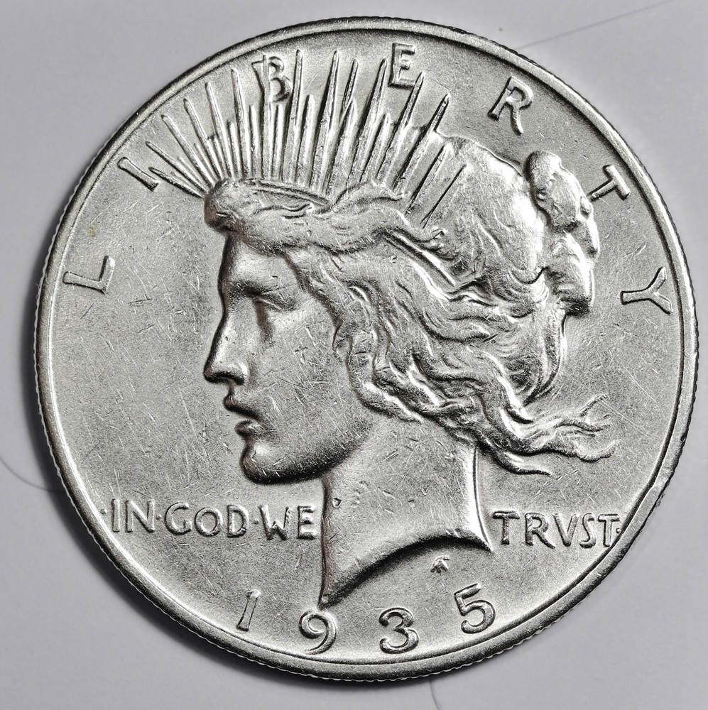 1935-s Peace Silver Dollar.  AU.  212223