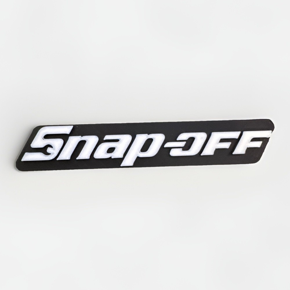 Snap-off Novelty 3D Printed Tool Box Badge.