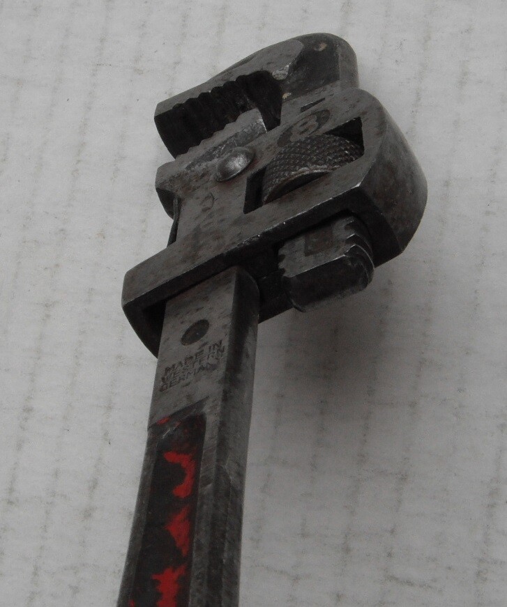 Small adjustable pipe wrench marked No 8...West Germany....old er