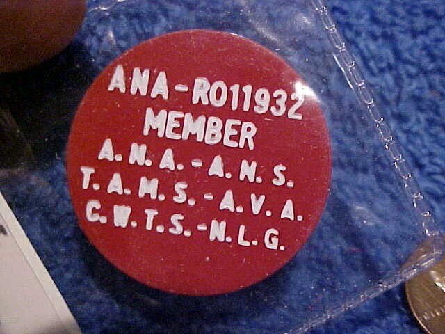 M. Fuld Baltimore Md Collector plastic token Red