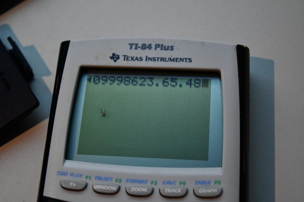 Texas Instruments TI-84 Plus Graphics Calculator with spot on OUTER screen works