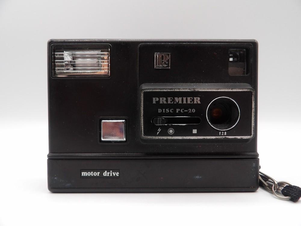 Vintage Premier PC-20 Motorized Disc Camera Point and Shoot Flash Untested
