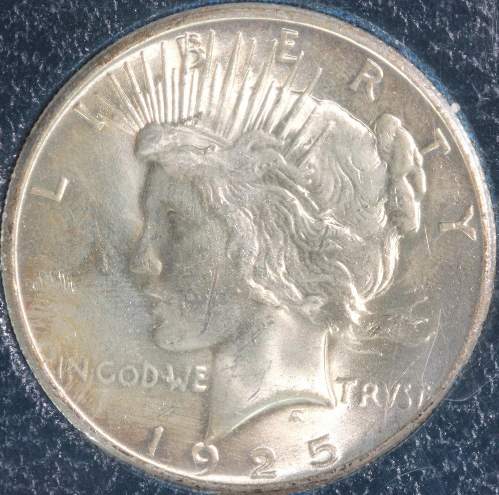 1925 PEACE SILVER DOLLAR PARAMOUNT INTERNATIONAL HOLDER--LIGHT TONING