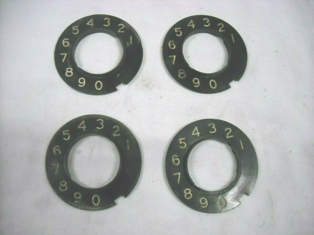 Four Automatic Electric Bakelite Number Plates, Black with White Numbers