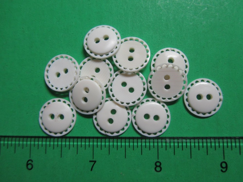 (12) 5/8" OPENWORK RIM WHITE PLASTIC 2-HOLE BUTTONS NEW (H509)