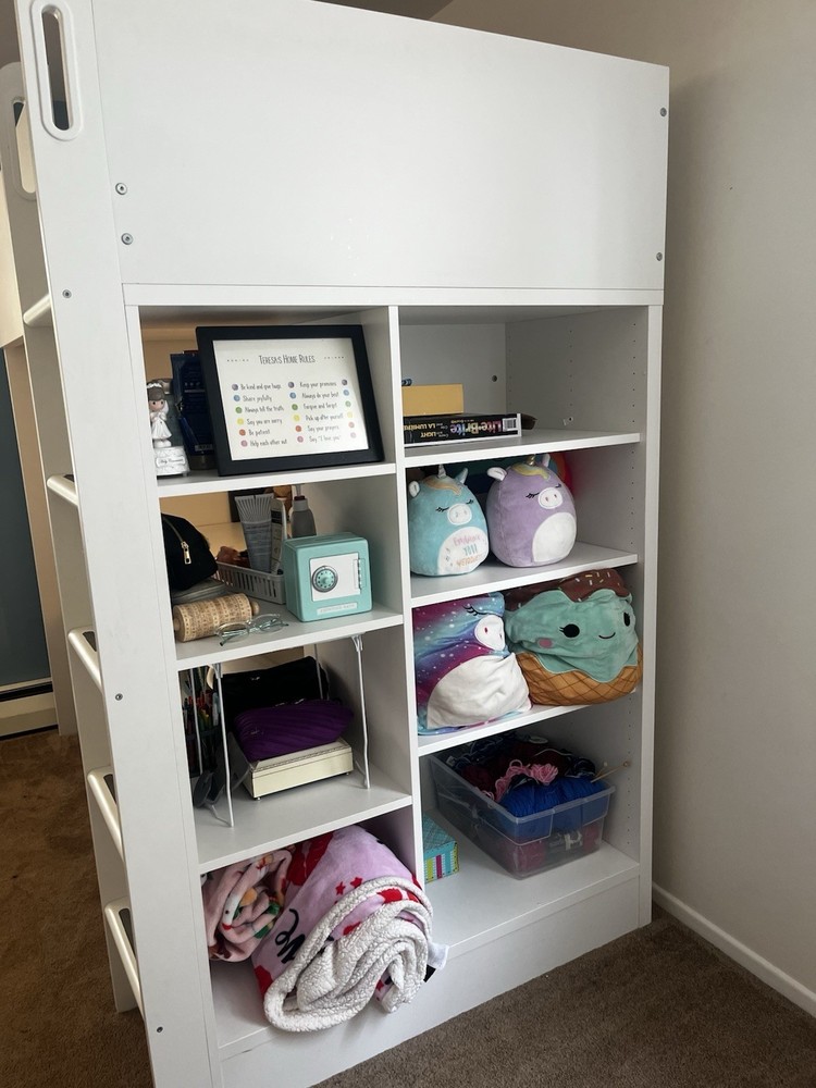 ikea loft bed with extra shelving and desk