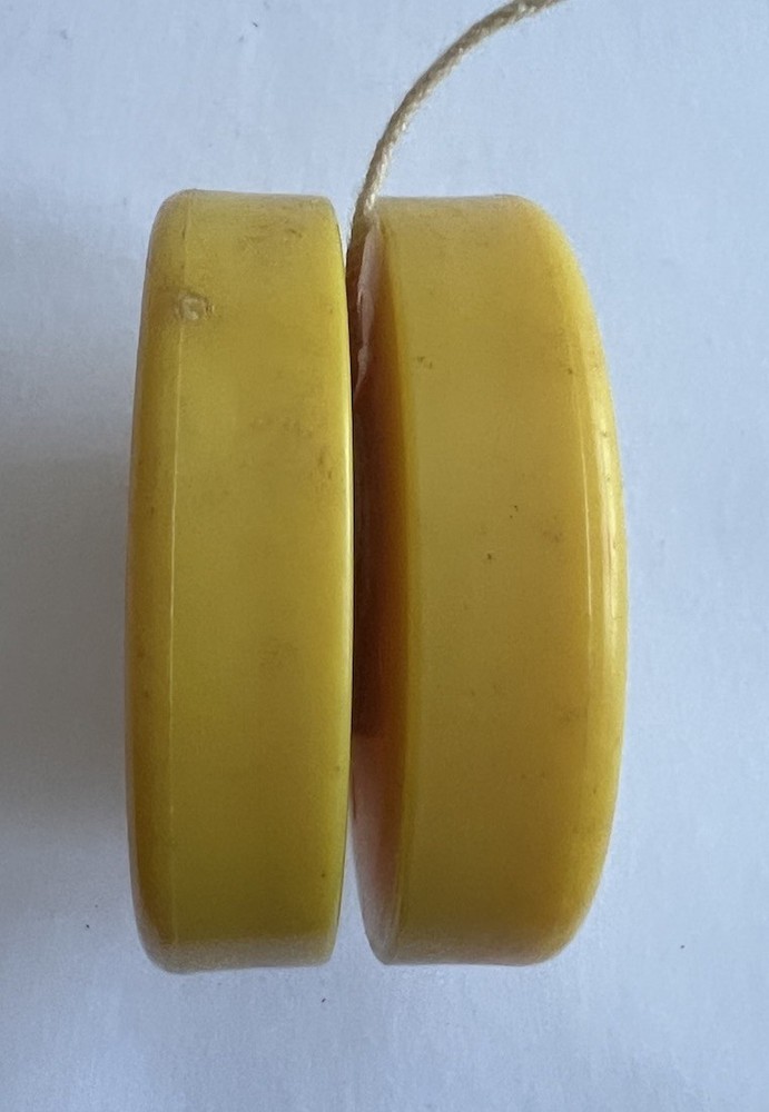 Vintage Yellow Plastic Yo-Yo RENK SEED Advertisement