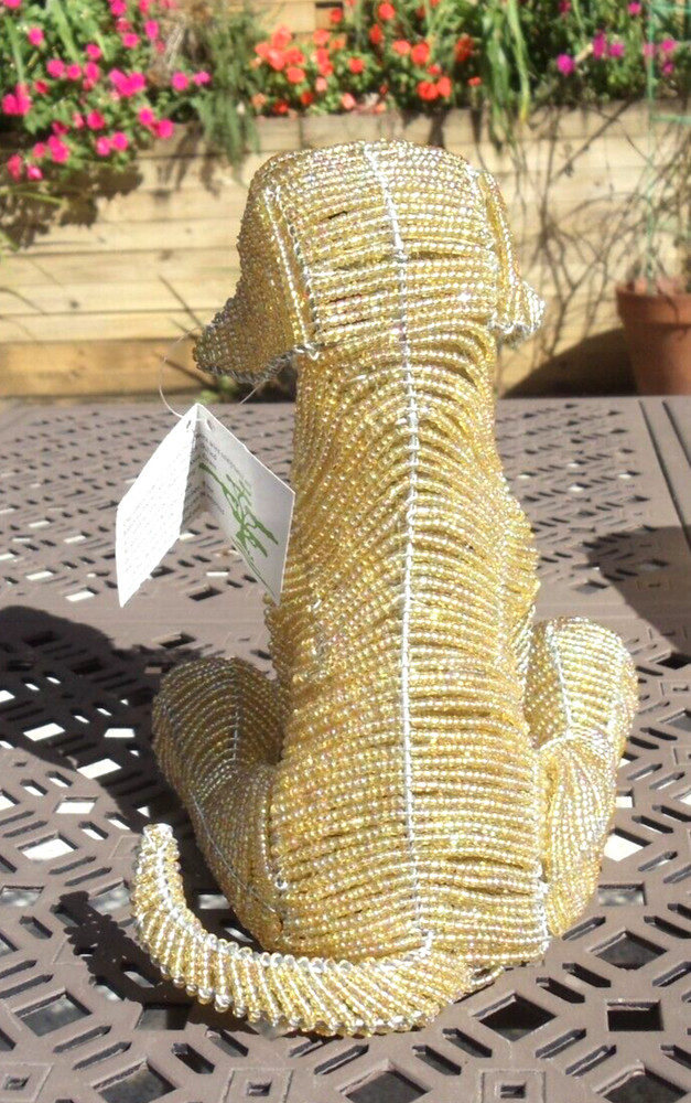 Beaded land: Yellow lab puppy