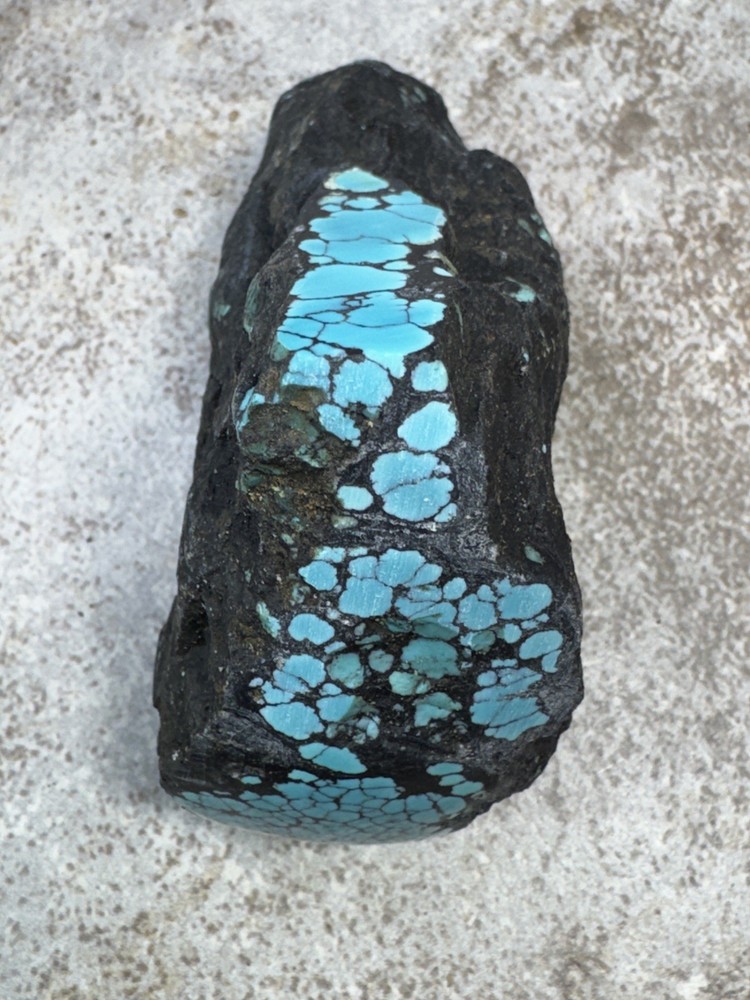 Hubei turquoise rough , solid spiderwebs nuggets in blue color tight pattern