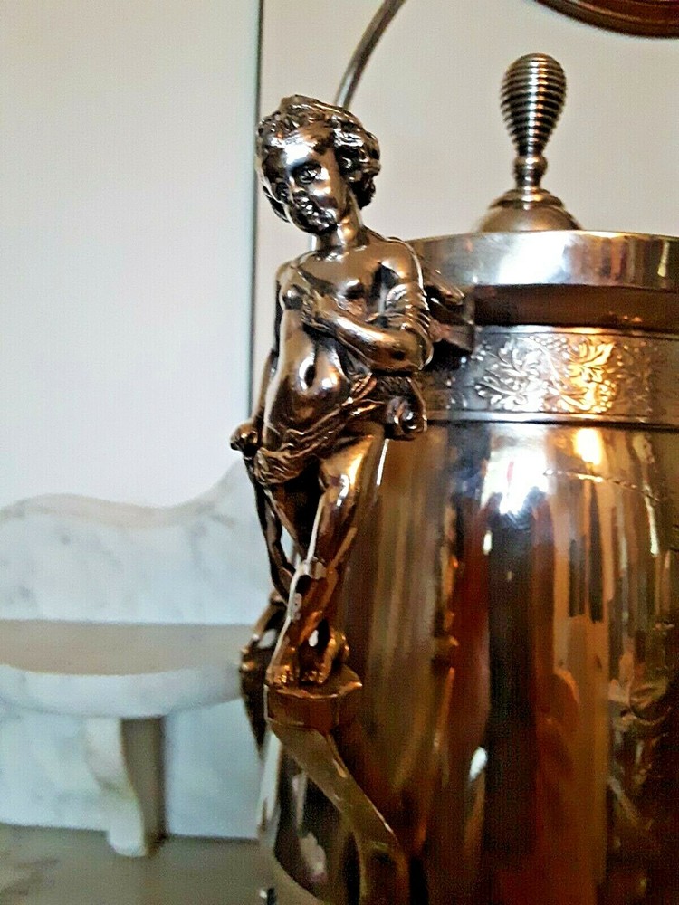 Wilcox Silver Plating Co. c.1870 Tilting Water Pitcher W/Cherub & Storks