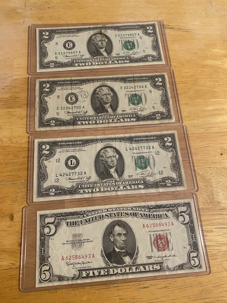 4 banknotes: 3 from 1976 and one from 1963.