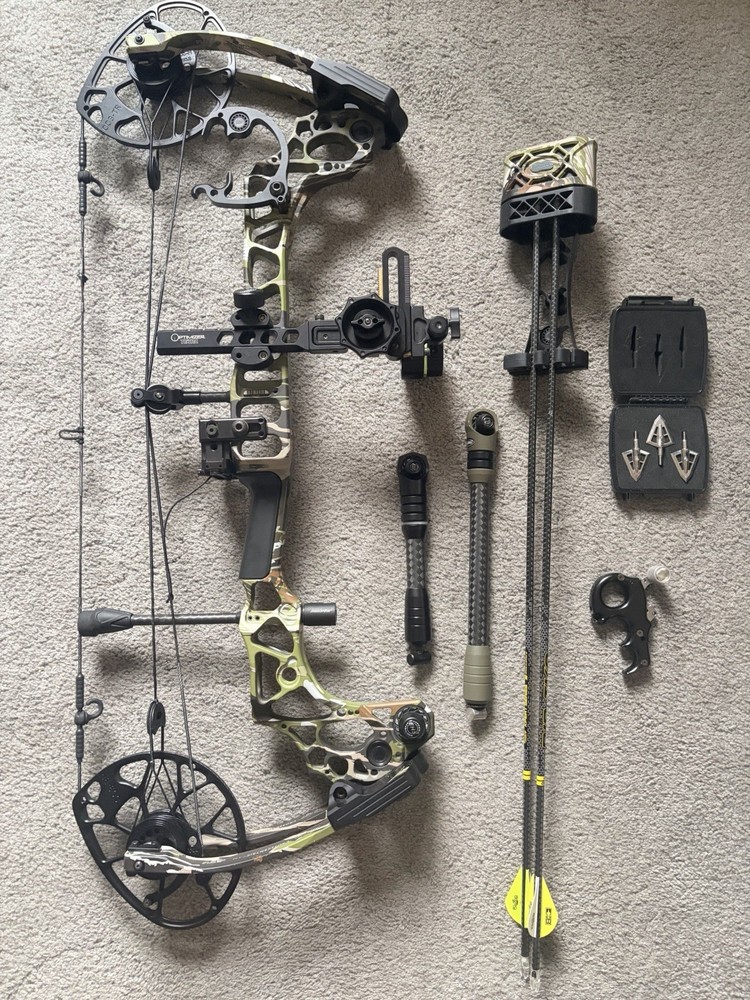 Matthew’s Triax Bow with Accessories and Case