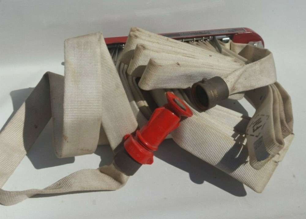 F-M Fireman Hose Rack with Fire Hose.