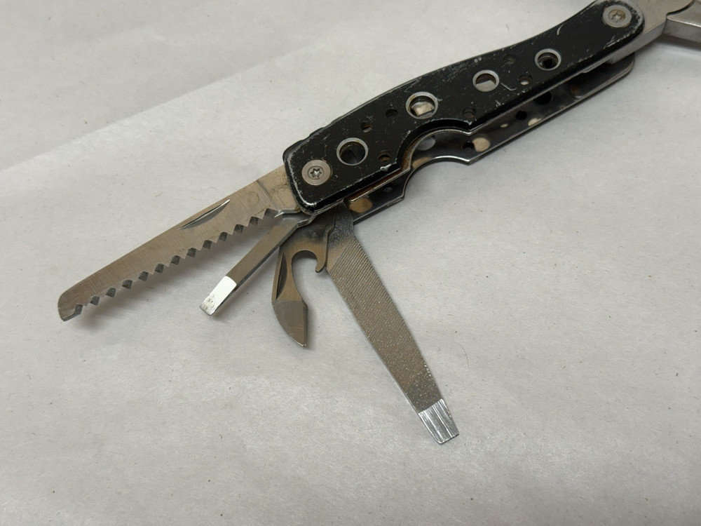 Snap-On Multi-Tool Knife Screwdriver File Saw Pliers