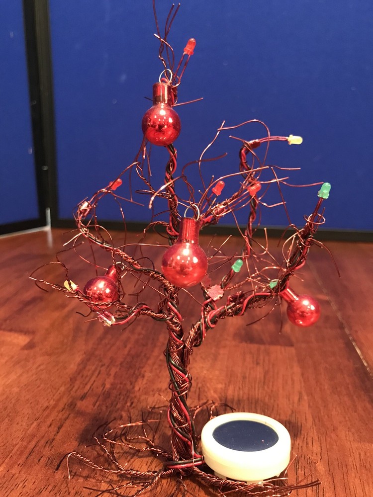 Twisted Red Wire Christmas Tree Plays Music