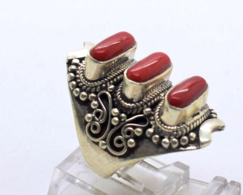 This is Sterling Silver Ring with Coral . adjustable fit