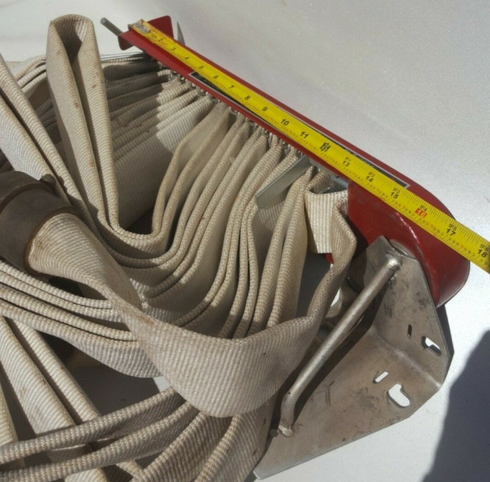 F-M Fireman Hose Rack with Fire Hose.