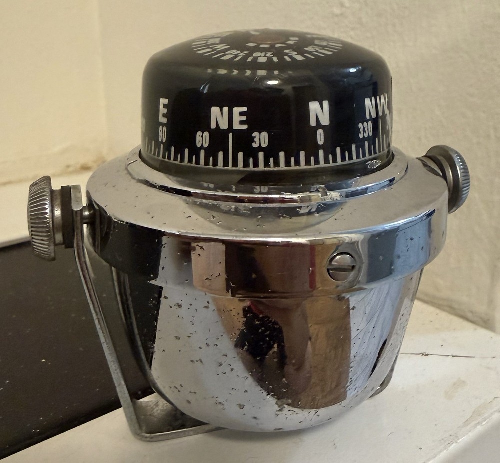 vintage marine compass manufactured by Aqua Meter