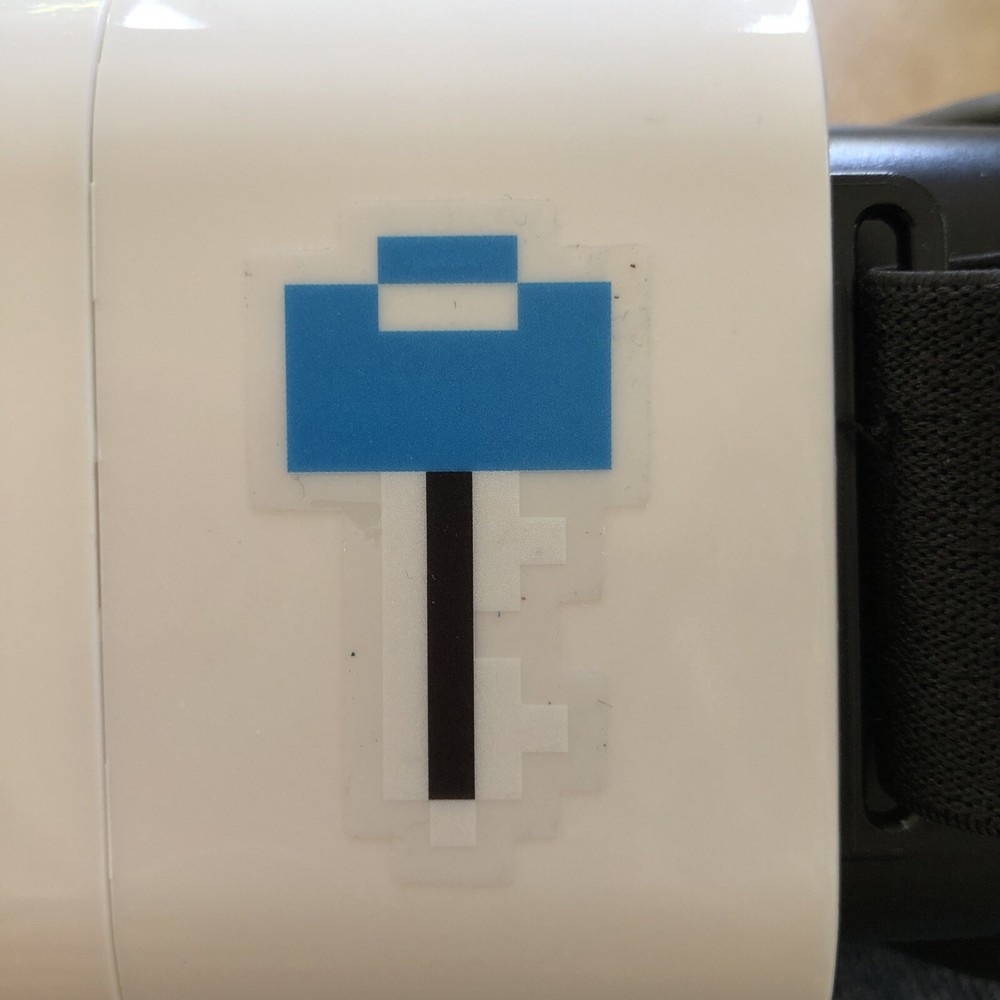 SHARPER IMAGE VR HEADSET WITH PAC MAN STICKERS